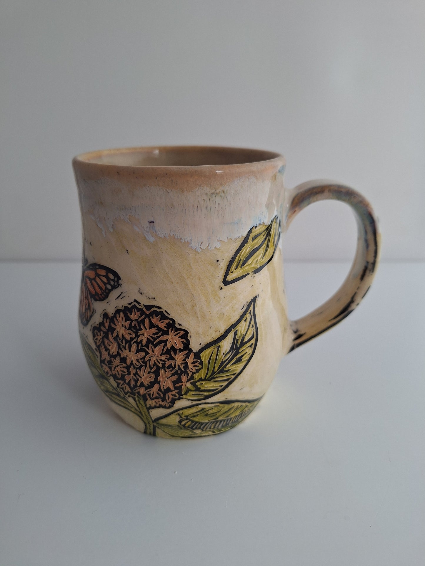 Hand-carved Monarch Mug