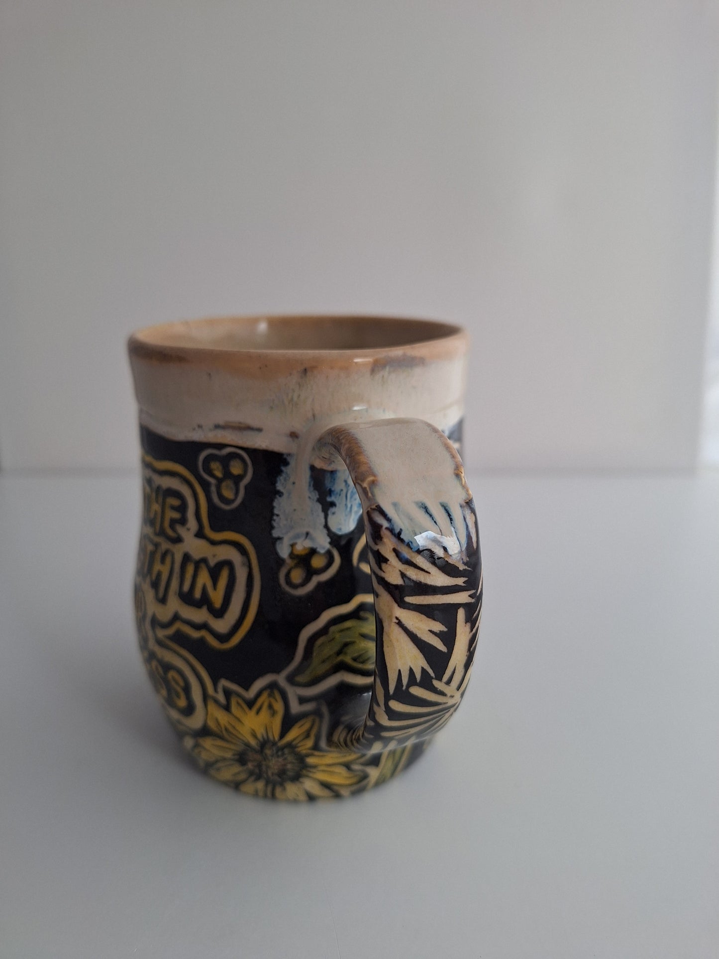 Hand-carved Strength in Softness Mug