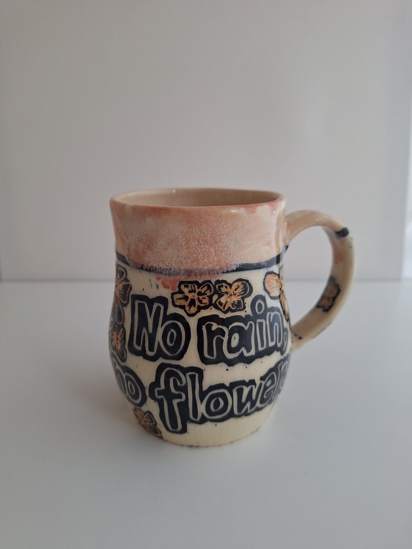 Hand-carved No Rain No Flowers Mug